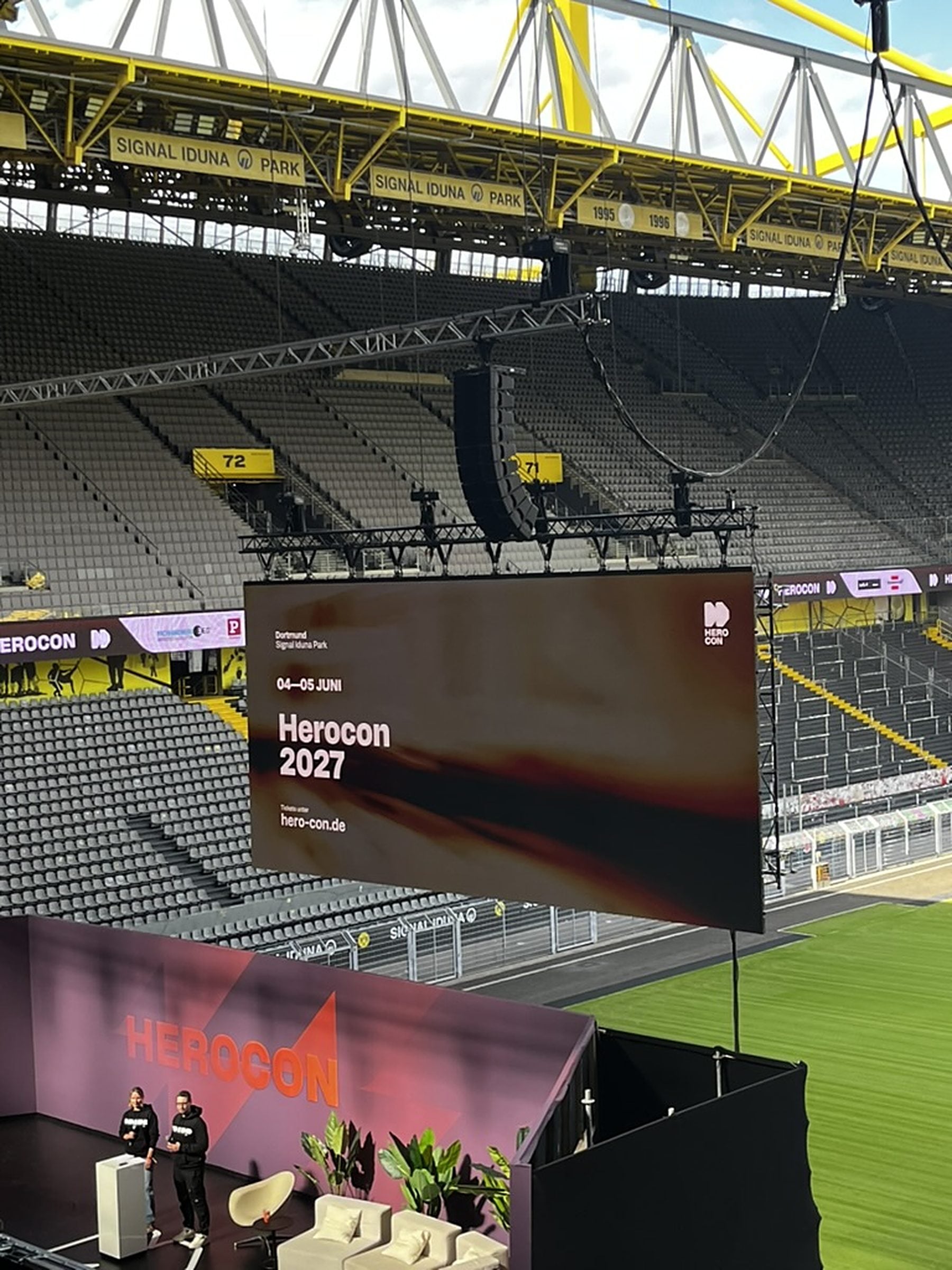 The Herocon stage at Signal Iduna Park in Dortmund, with "Herocon 2027" on the screen